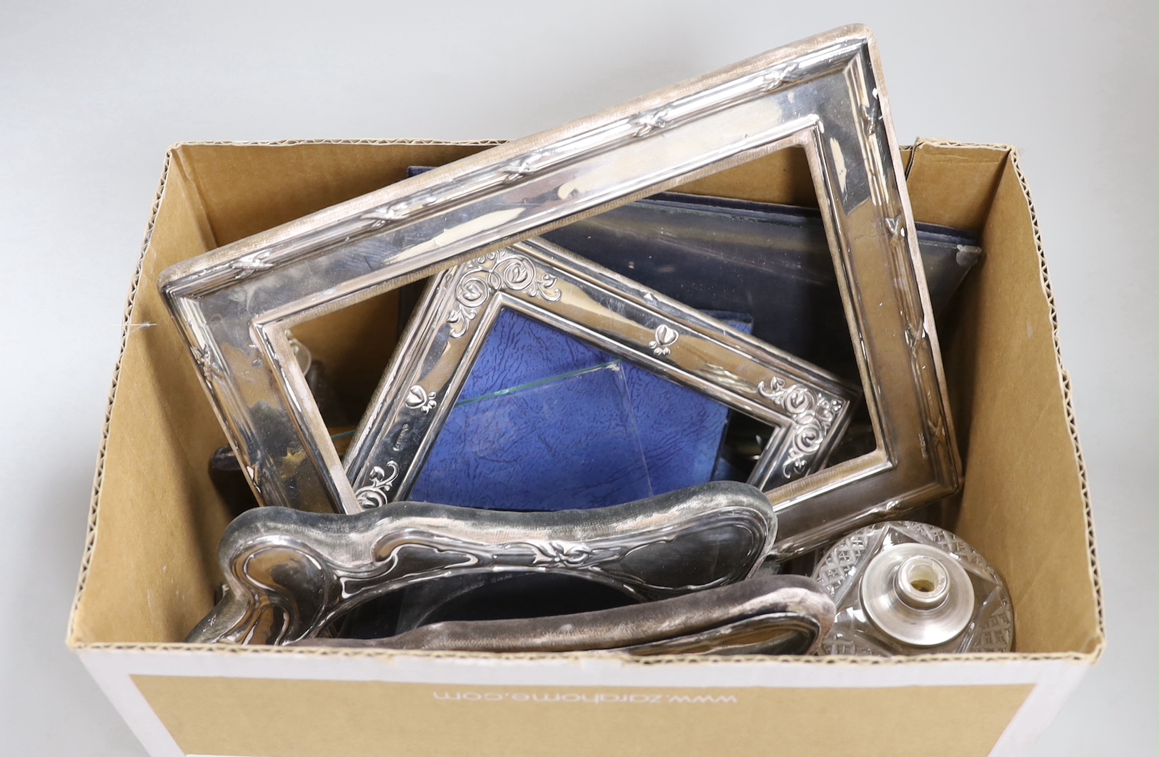 Eight assorted modern silver mounted photograph frames, including a pair, largest 25.6cm and three mounted glass scent bottles.